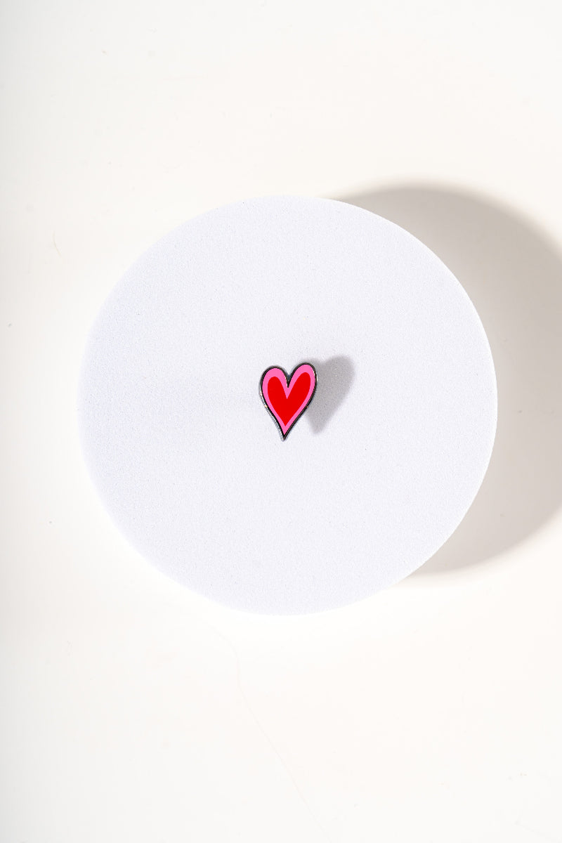 Removable metal heart shaped charm for dog's collar original design by Mou Mou Couture displayed on white background.