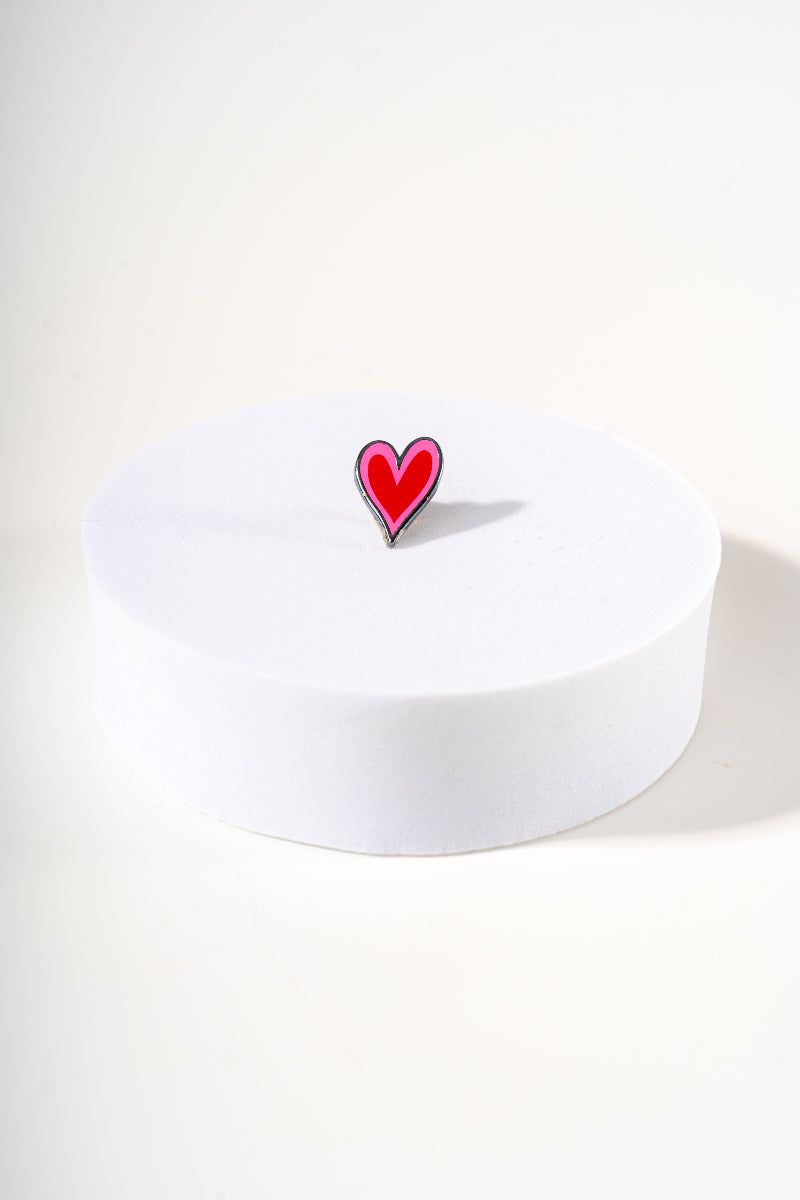 Removable metal heart shaped charm for dog's collar original design by Mou Mou Couture displayed on white background.