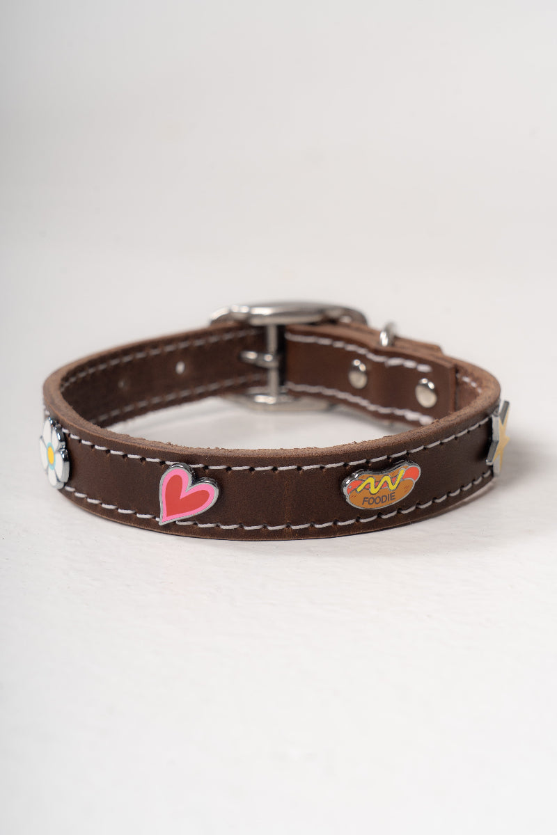 Handcrafted luxury leather collar by Mou Mou Couture with removable charms displayed on white background
