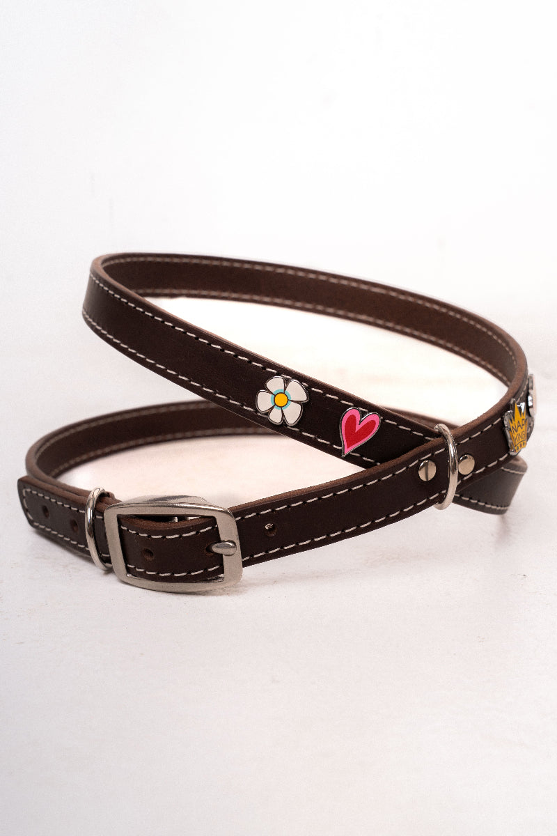 Handcrafted luxury dog harness with removable metal charms by Mou Mou Couture displayed on a white background