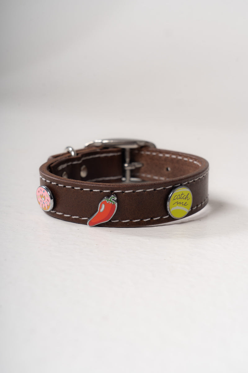 Handcrafted luxury leather collar by Mou Mou Couture with removable charms displayed on white background