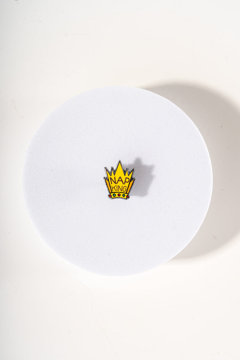 Removable metal crown shaped charm for dog's collar original design by Mou Mou Couture displayed on white background.