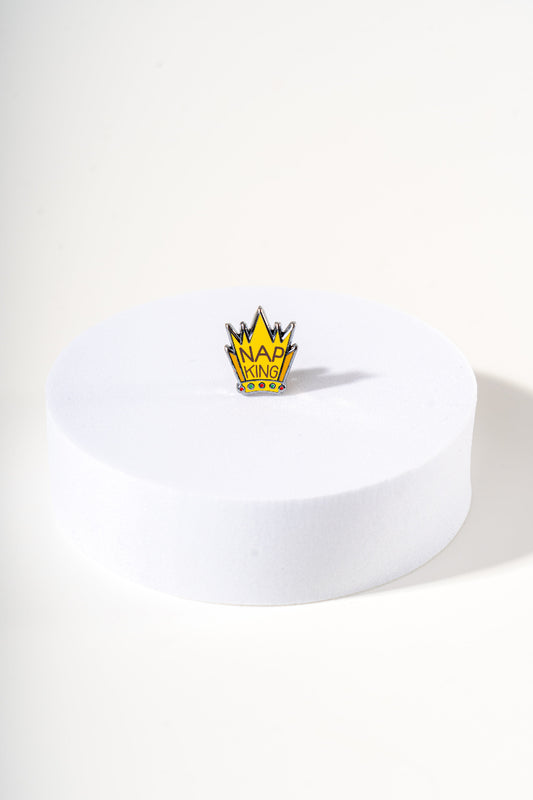 Removable metal crown shaped charm for dog's collar original design by Mou Mou Couture displayed on white background.