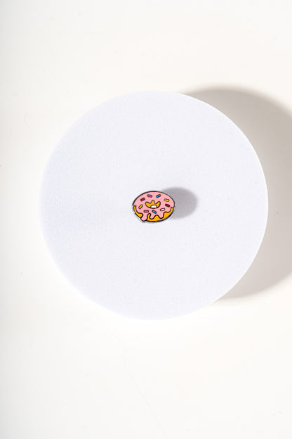 Removable metal ball shaped charm for dog's collar original design by Mou Mou Couture displayed top view on white background.