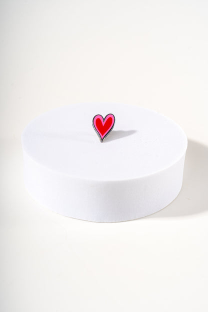 Removable metal heart shaped charm for dog's collar original design by Mou Mou Couture displayed on white background.