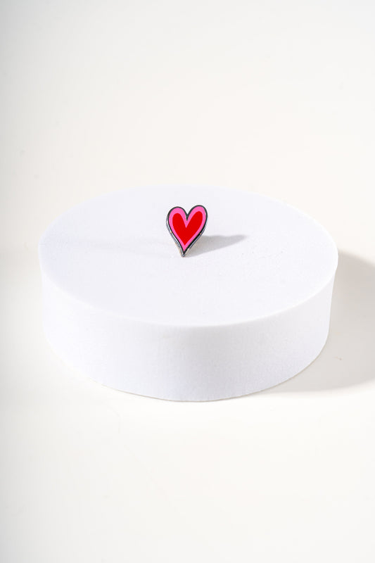 Removable metal heart shaped charm for dog's collar original design by Mou Mou Couture displayed on white background.