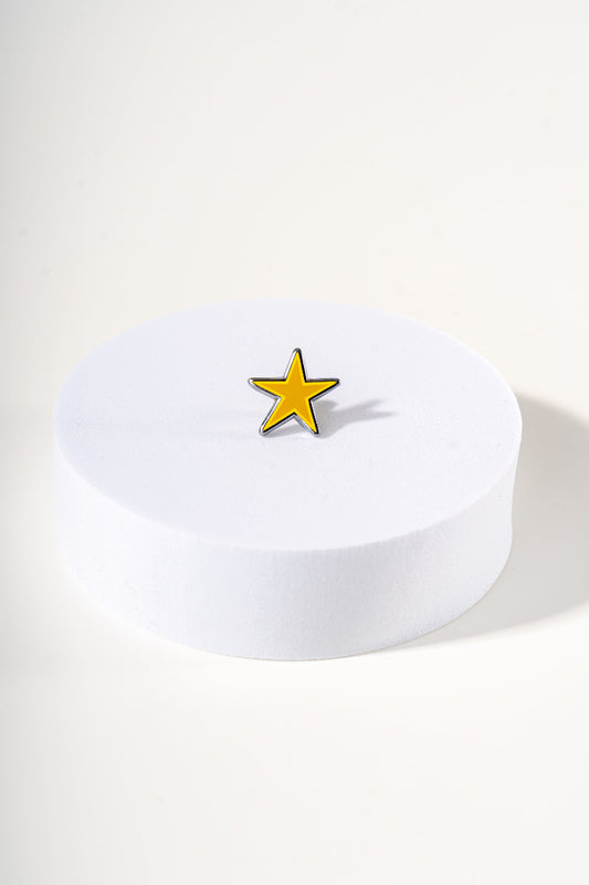 Removable metal star shaped charm for dog's collar original design by Mou Mou Couture displayed on white background.