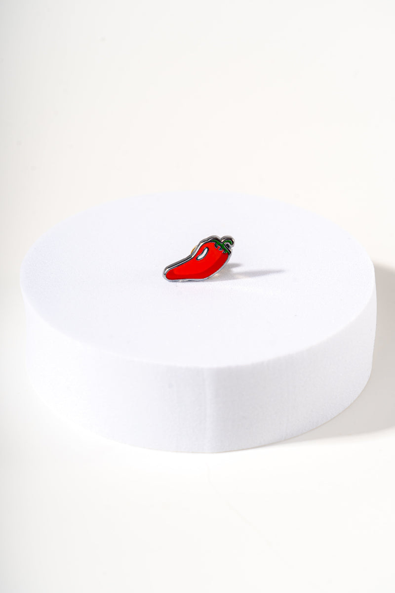 Removable metal chili shaped charm for dog's collar original design by Mou Mou Couture displayed on white background.