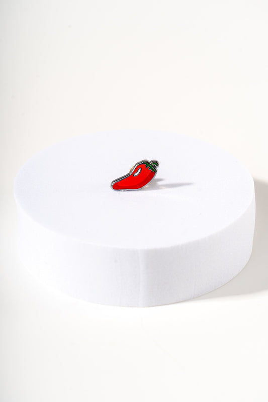 Removable metal chili shaped charm for dog's collar original design by Mou Mou Couture displayed on white background.
